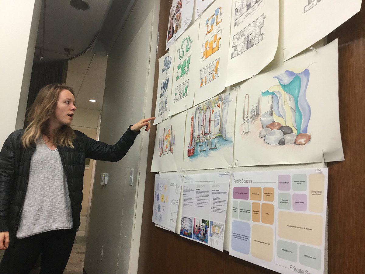 One lady looking at design possibilities for Shop One.